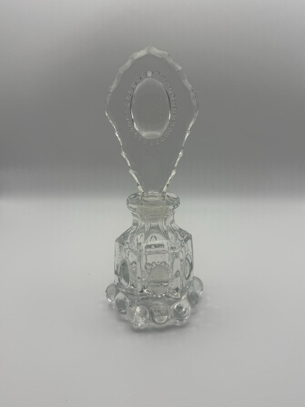 Vintage Pressed Clear Glass Perfume Bottle Tall Stopper Medallion Beaded 7 In